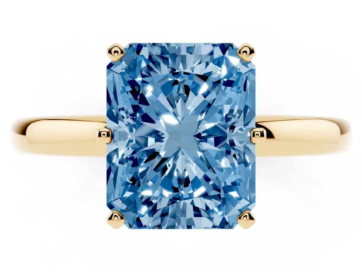 Fancy Blue Radiant Cut Solitaire Diamond Ring with Six-Prong Setting on a Classic Band Yellow gold