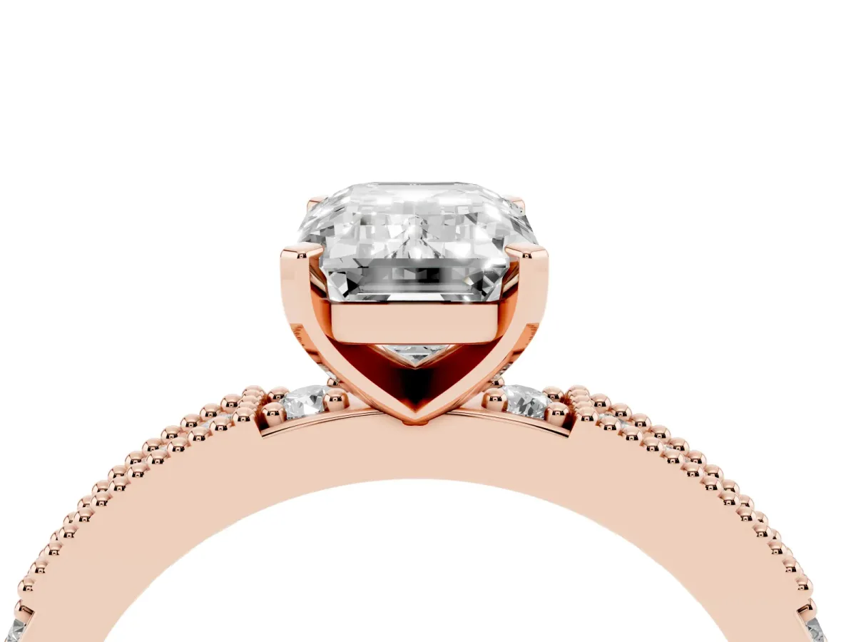 Emerald Cut Solitaire with Pavé Band and Four-Prong Setting Rose gold