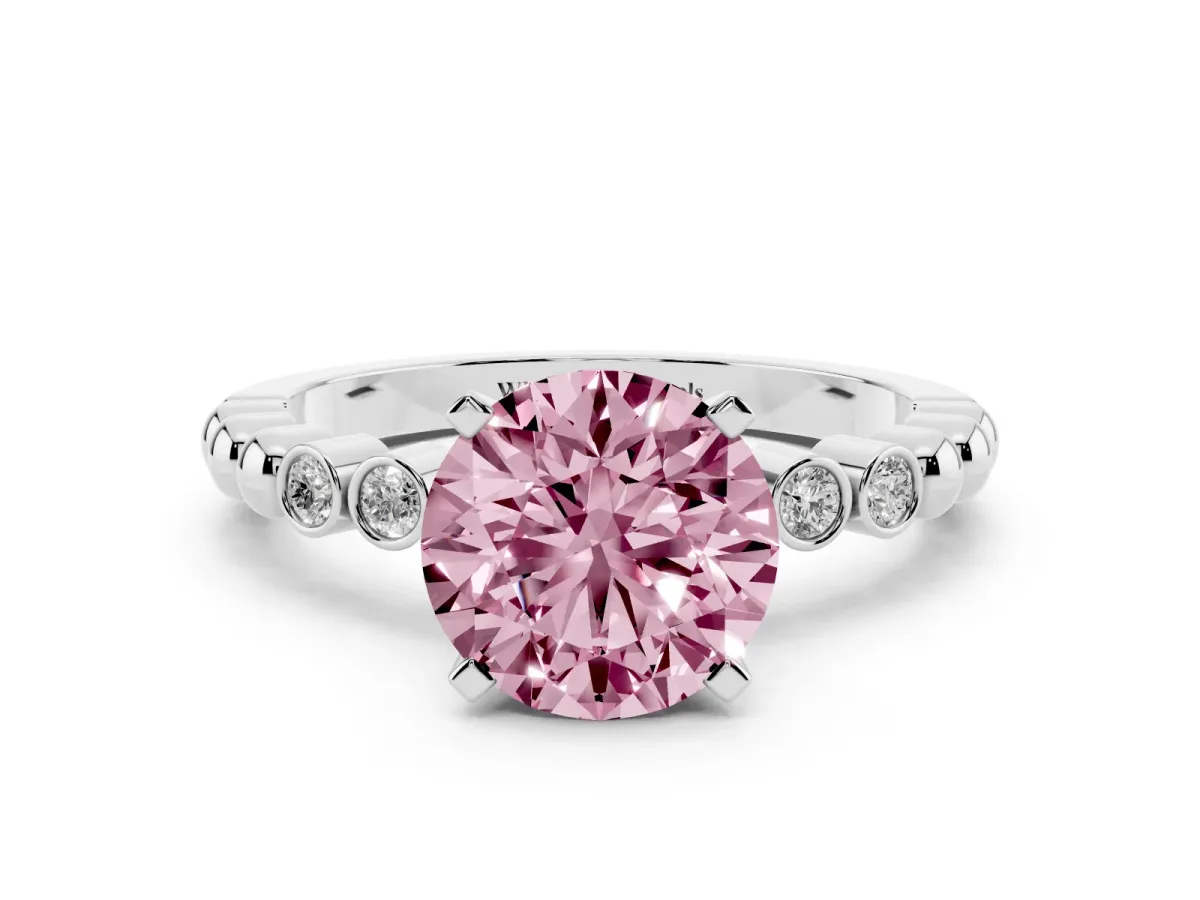 Fancy Pink Round Cut Solitaire Bezel Accent Diamond Engagement Ring with Beaded Band and Four-Prong Setting Platinum