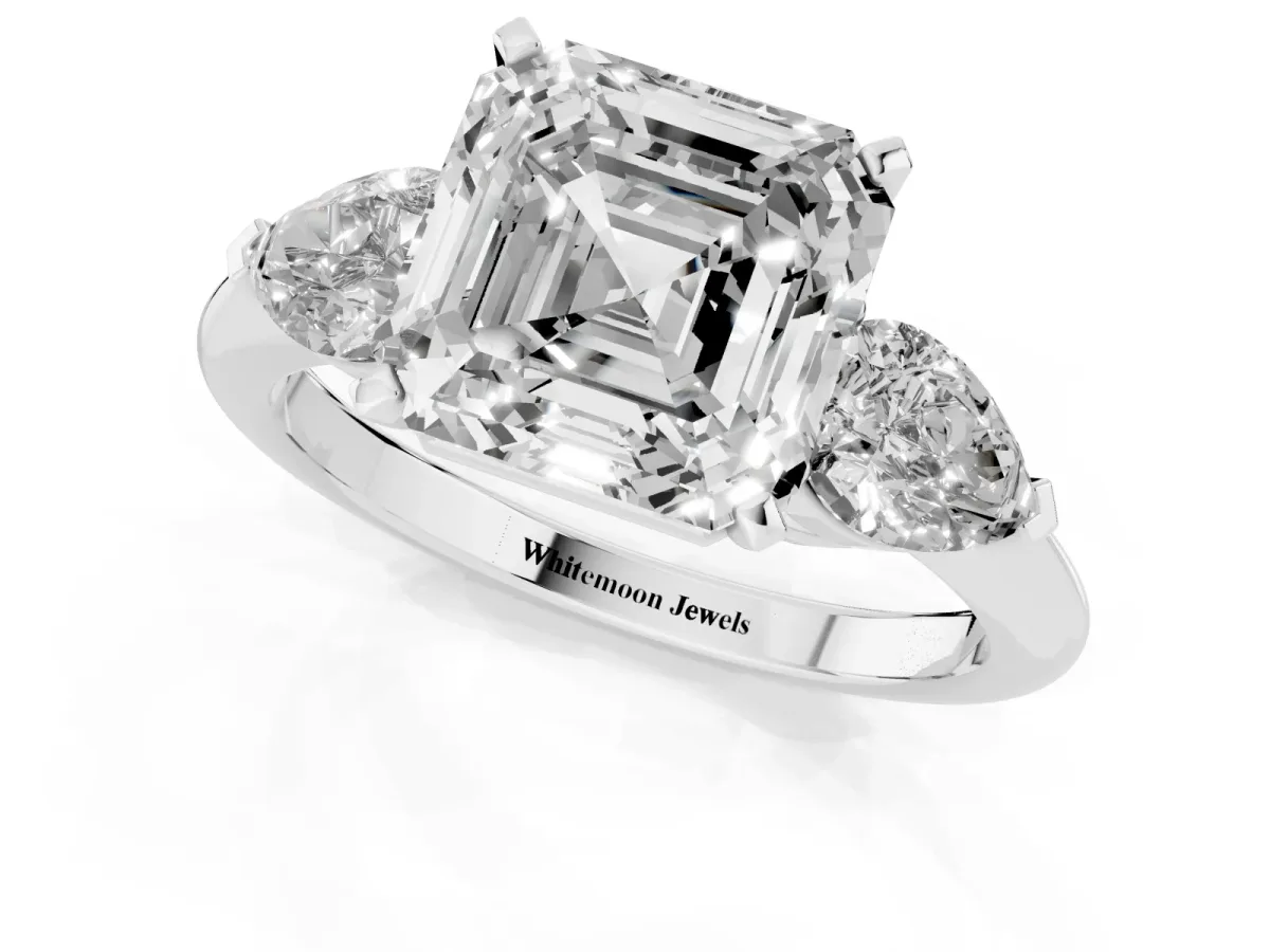 Three-Stone Asscher Cut Diamond Ring with Pear Side Stones and Four-Prong Setting Silver