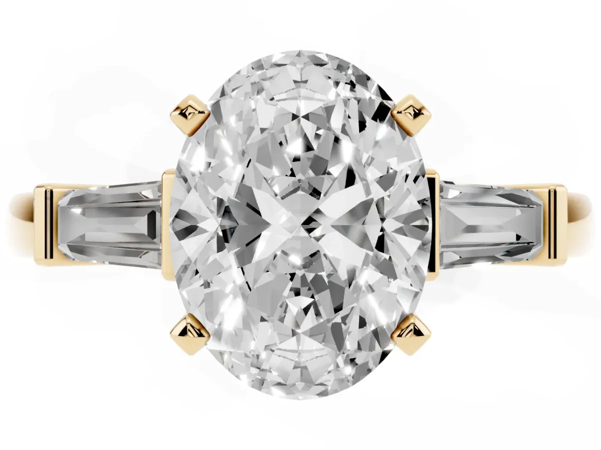 Oval Cut Cut Diamond Solitaire Ring with Tapered Baguette Accents and Four-Prong Setting Yellow gold