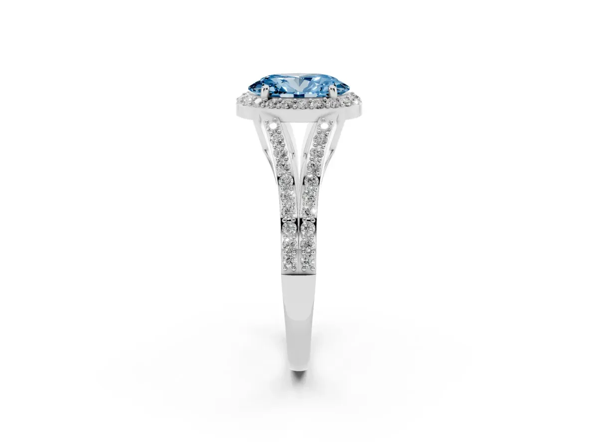 Fancy Blue Oval Cut Halo Split Shank Pave Diamond Ring with Four-Prong Setting Silver