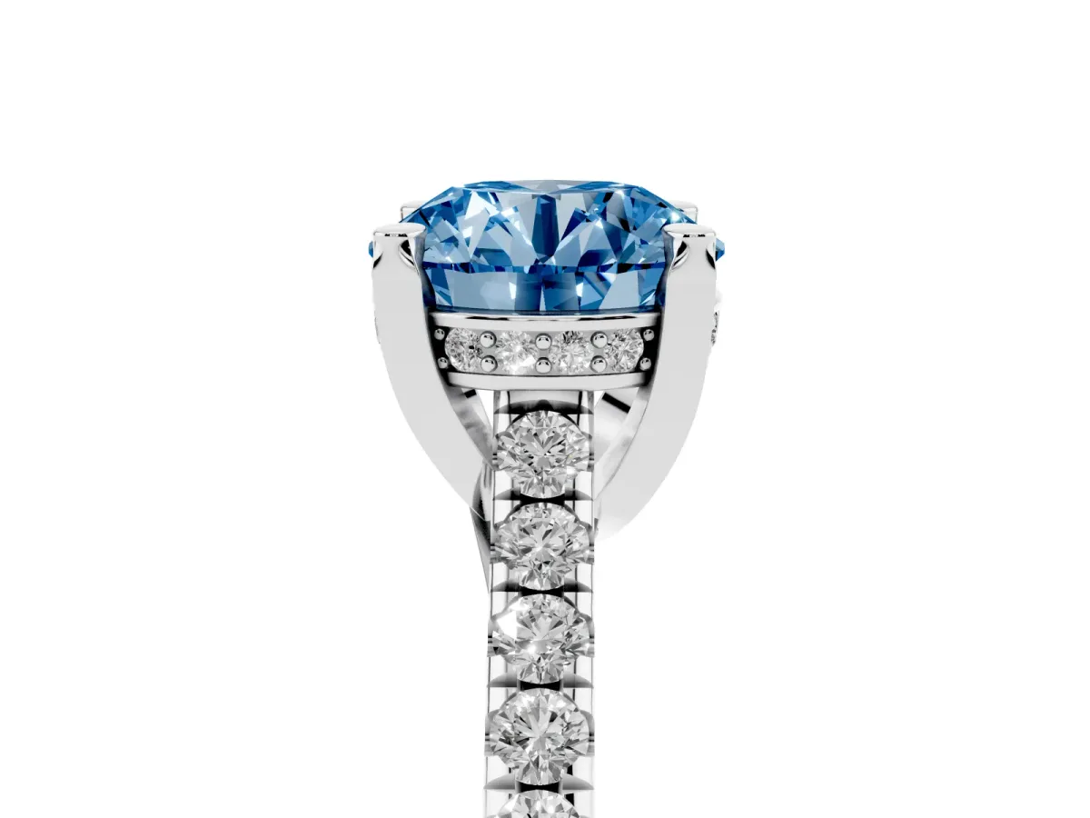 Fancy Blue Round Cut Brilliant Diamond Solitaire with Pavé Band and Four-Prong Setting Platinum