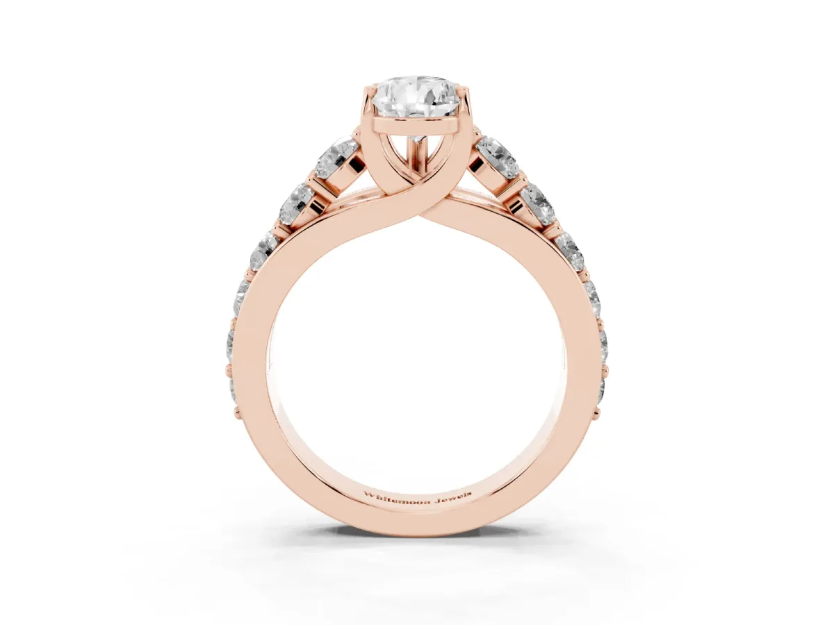 Pear Cut Diamond Engagement Ring with Pavé Band and Four-Prong Setting Rose gold