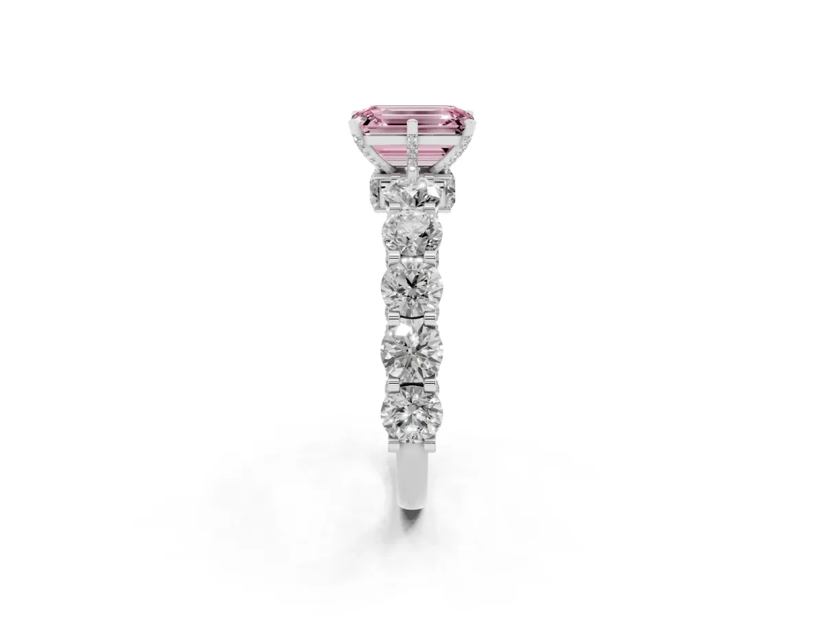 Fancy Pink Emerald Cut Diamond Side Stone Engagement Ring with Four-Prong Setting Platinum