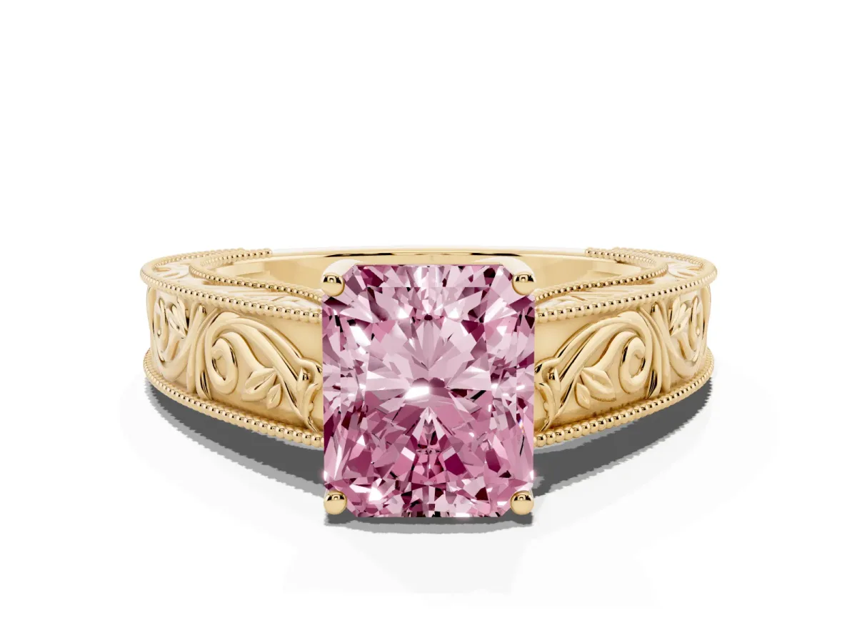 Fancy Pink Radiant Cut Diamond Solitaire Ring with Engraved Band and Four-Prong Setting Yellow gold