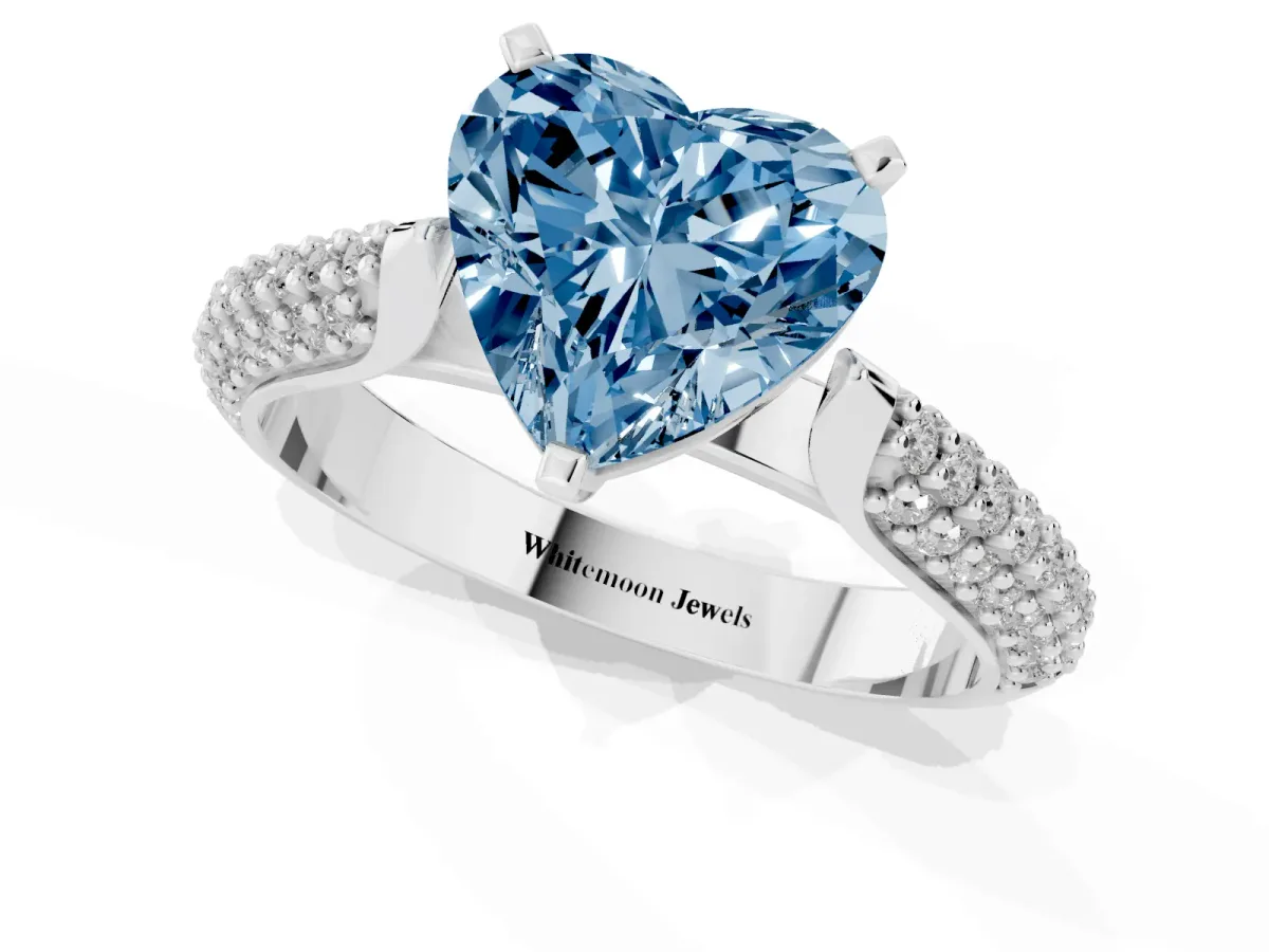 Fancy Blue Heart Cut Diamond Solitaire Engagement Ring with Multi-Row Round Pavé Band and Prong Setting Silver