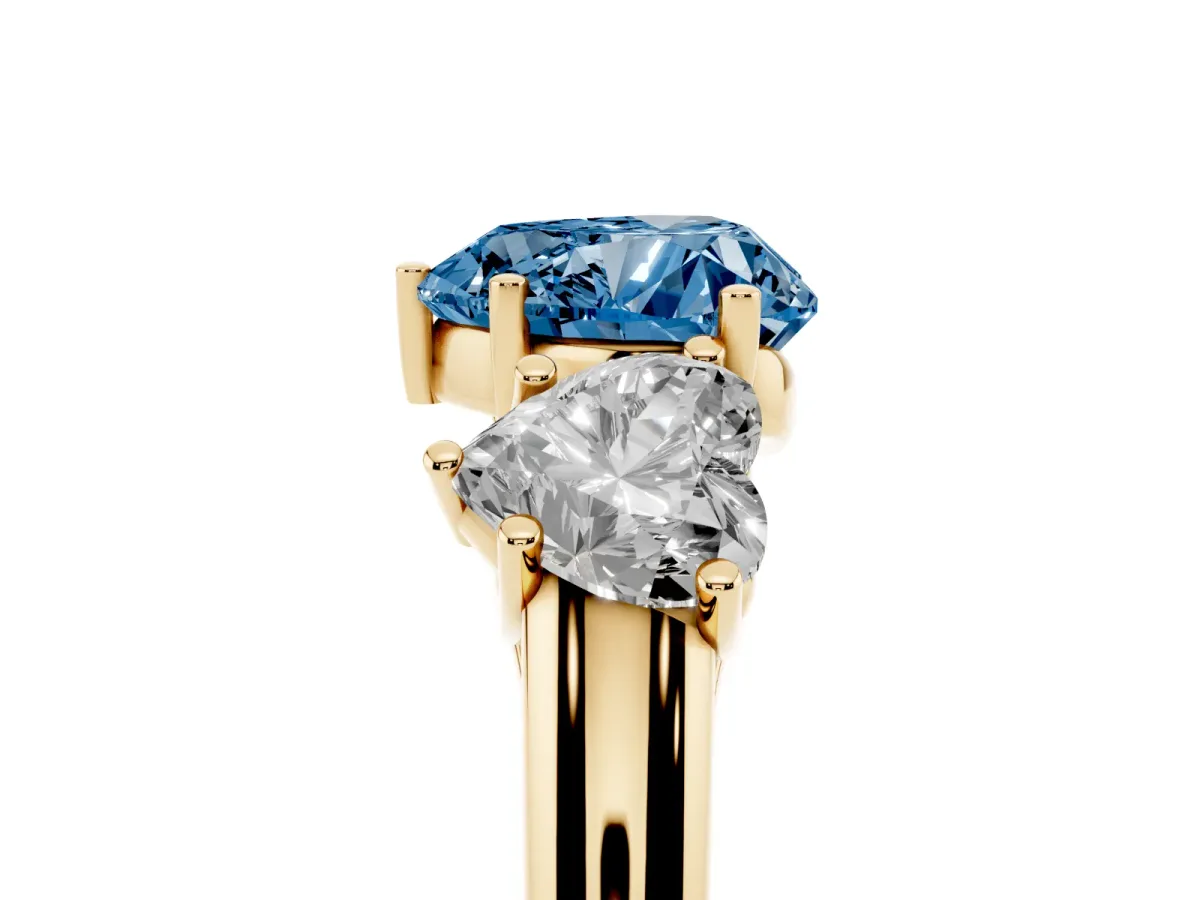 Fancy Blue Three-Stone Heart Cut Diamond Engagement Ring with Prong Setting Yellow gold