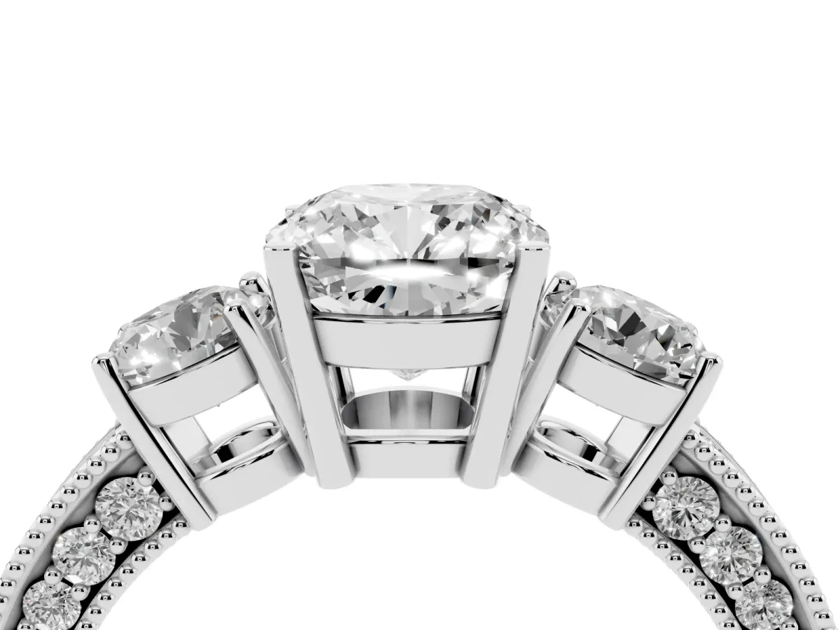Cushion Cut Three-Stone Diamond Ring with Pavé Band and Four-Prong Setting Silver