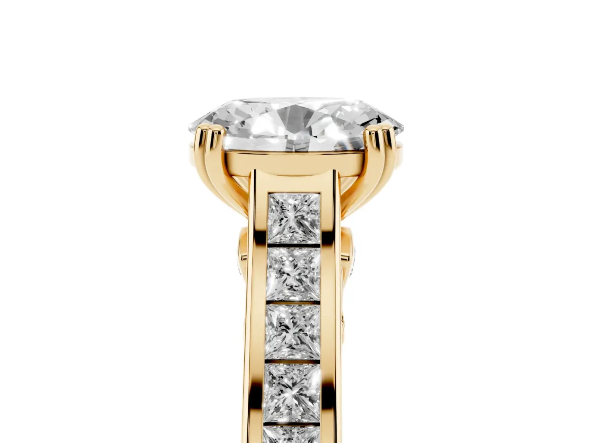 Oval Cut Cut Channel Set Solitaire Engagement Ring with Prong Setting Yellow gold