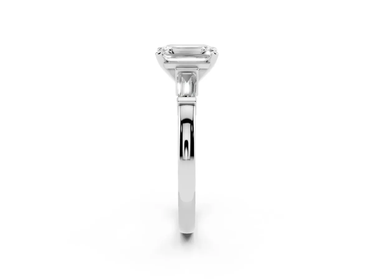 Emerald Cut Cut Diamond Solitaire Ring with Tapered Baguette Accents and Four-Prong Setting Silver