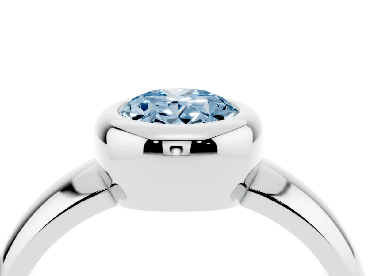 Fancy Blue Bezel Set Oval Cut Solitaire Ring with Wide Band Platinum