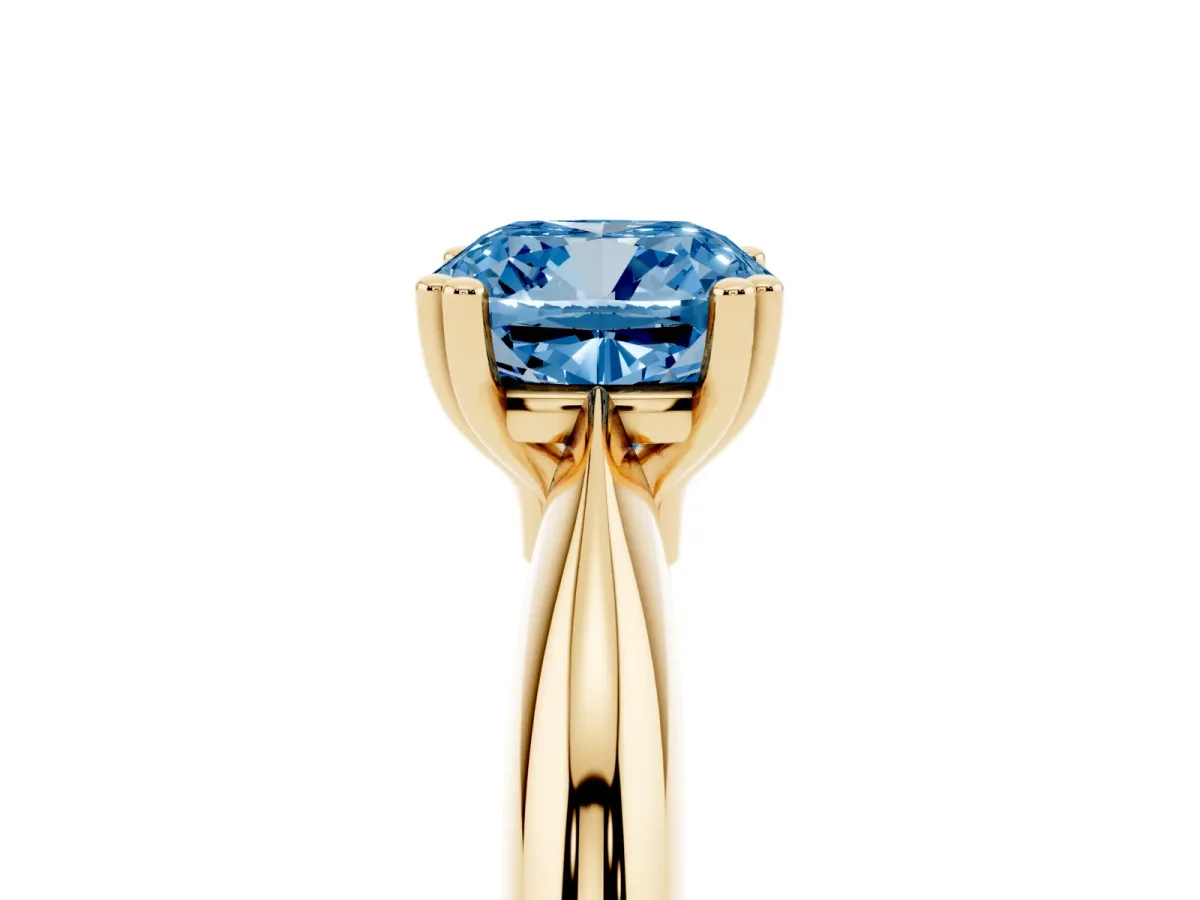 Fancy Blue Cushion Cut Cut Solitaire Engagement Ring with Tapered Band and Four-Prong Setting Yellow gold