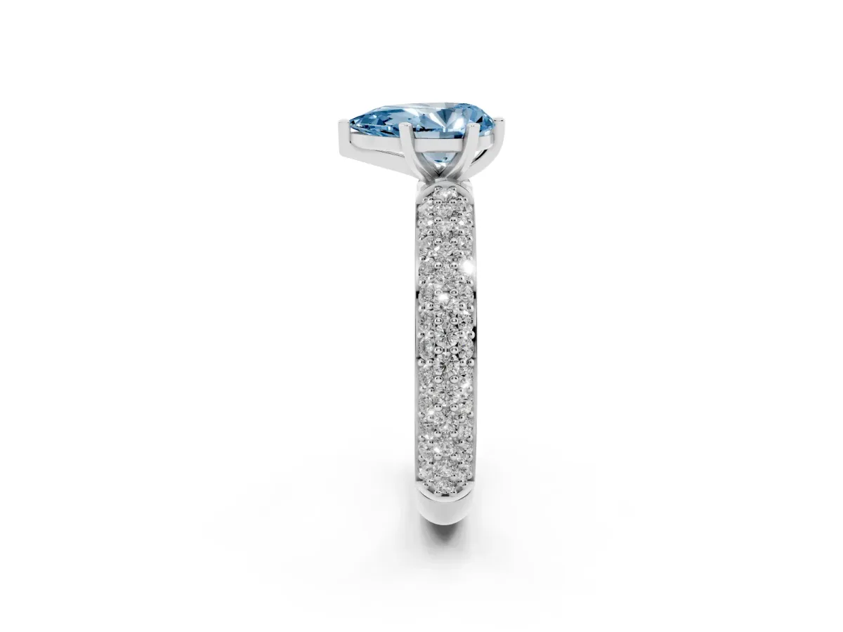 Fancy Blue Pear Cut Diamond Solitaire Ring with Prong Setting and Pavé Band Silver