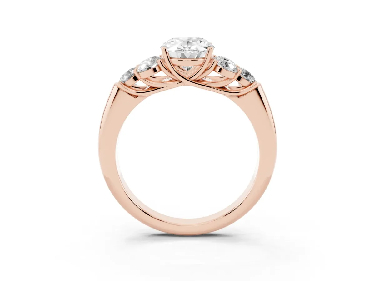 Oval Cut Cut Diamond Cluster Ring with Round Accent Stones and Prong Setting on a Classic Band Rose gold