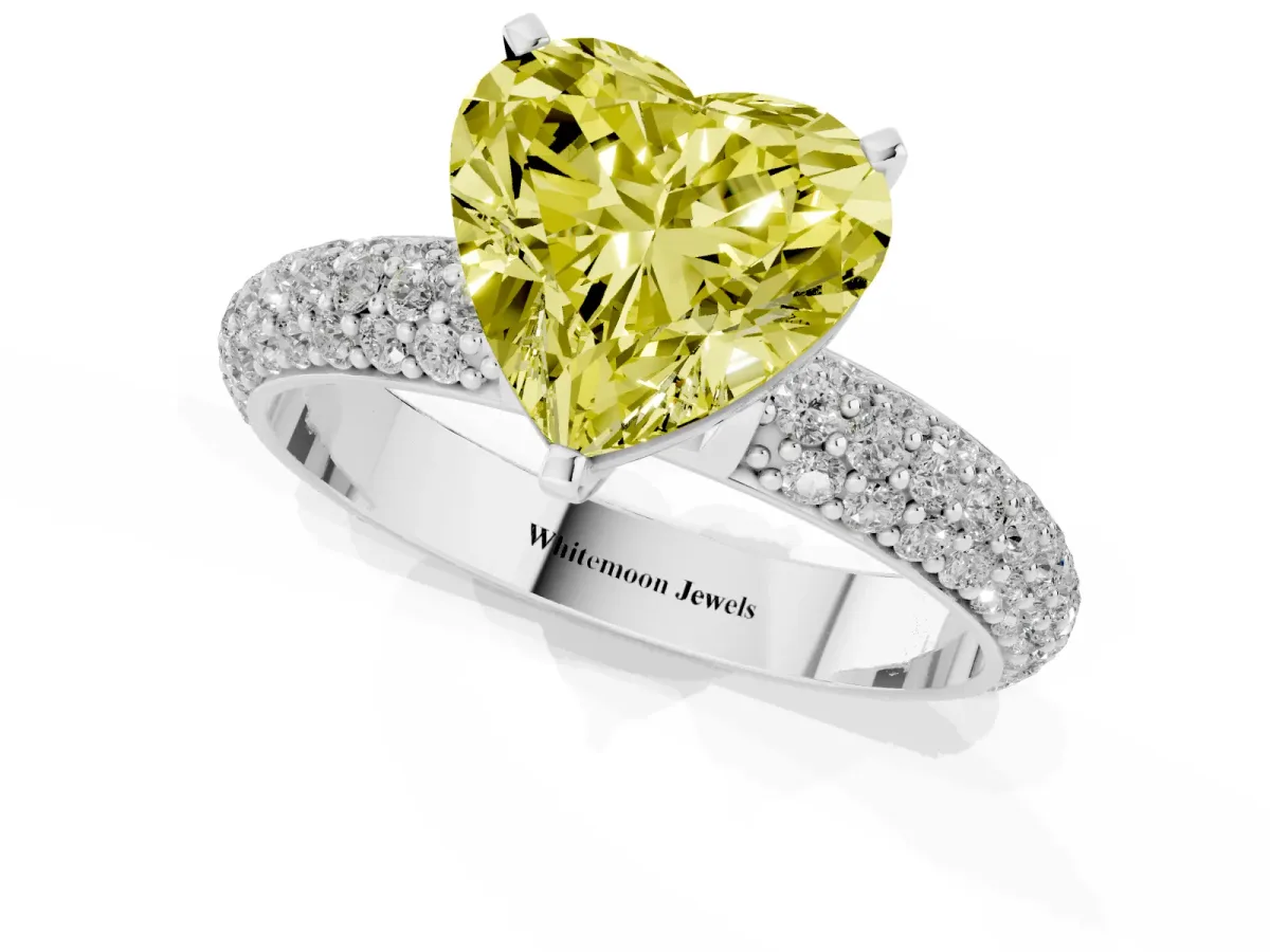 Fancy Yellow Heart Cut Diamond Solitaire Ring with Prong Setting and Pavé Band Silver