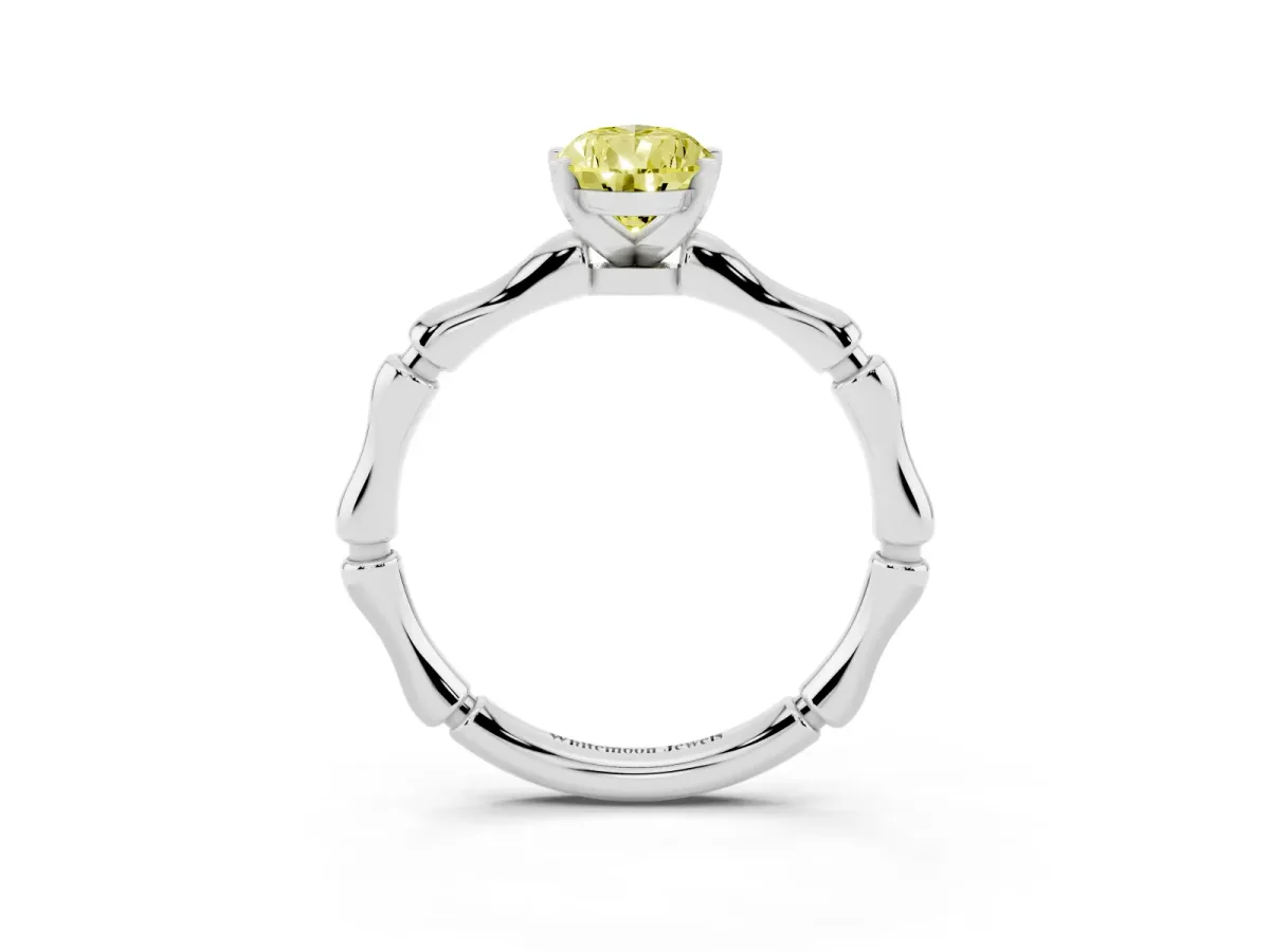 Fancy Yellow Pear Cut Solitaire Diamond Ring with Bamboo Band and Four-Prong Setting Silver