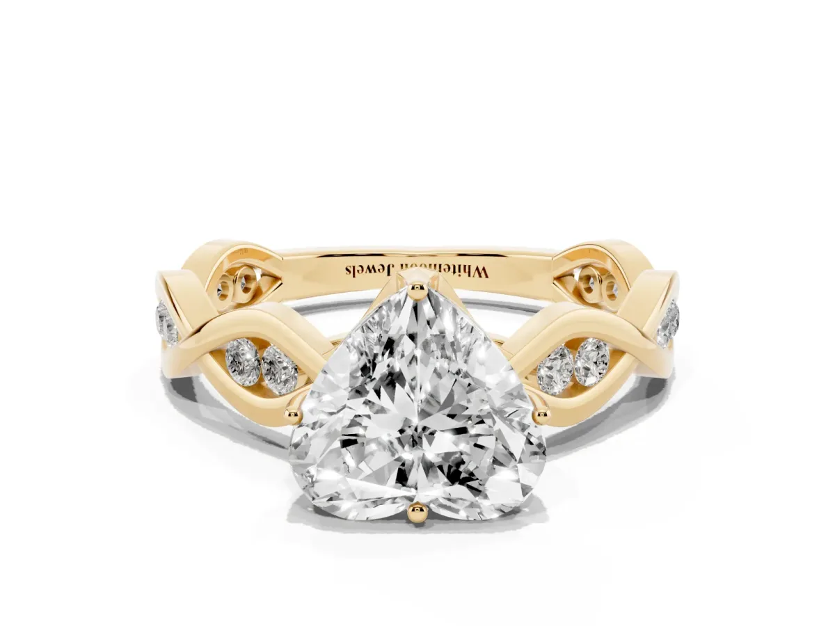 Heart Cut Solitaire Twist Band with Leaf Prong Setting Yellow gold