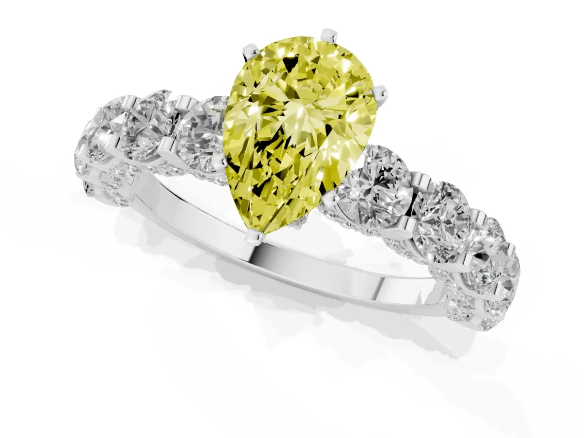 Fancy Yellow Pear Cut Diamond Side Stone Engagement Ring with Four-Prong Setting White gold