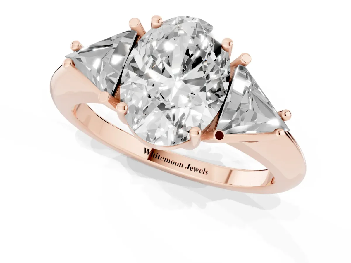 Three-Stone Oval Cut Diamond Engagement Ring with Trillion Side Stones and Prong Setting Rose gold