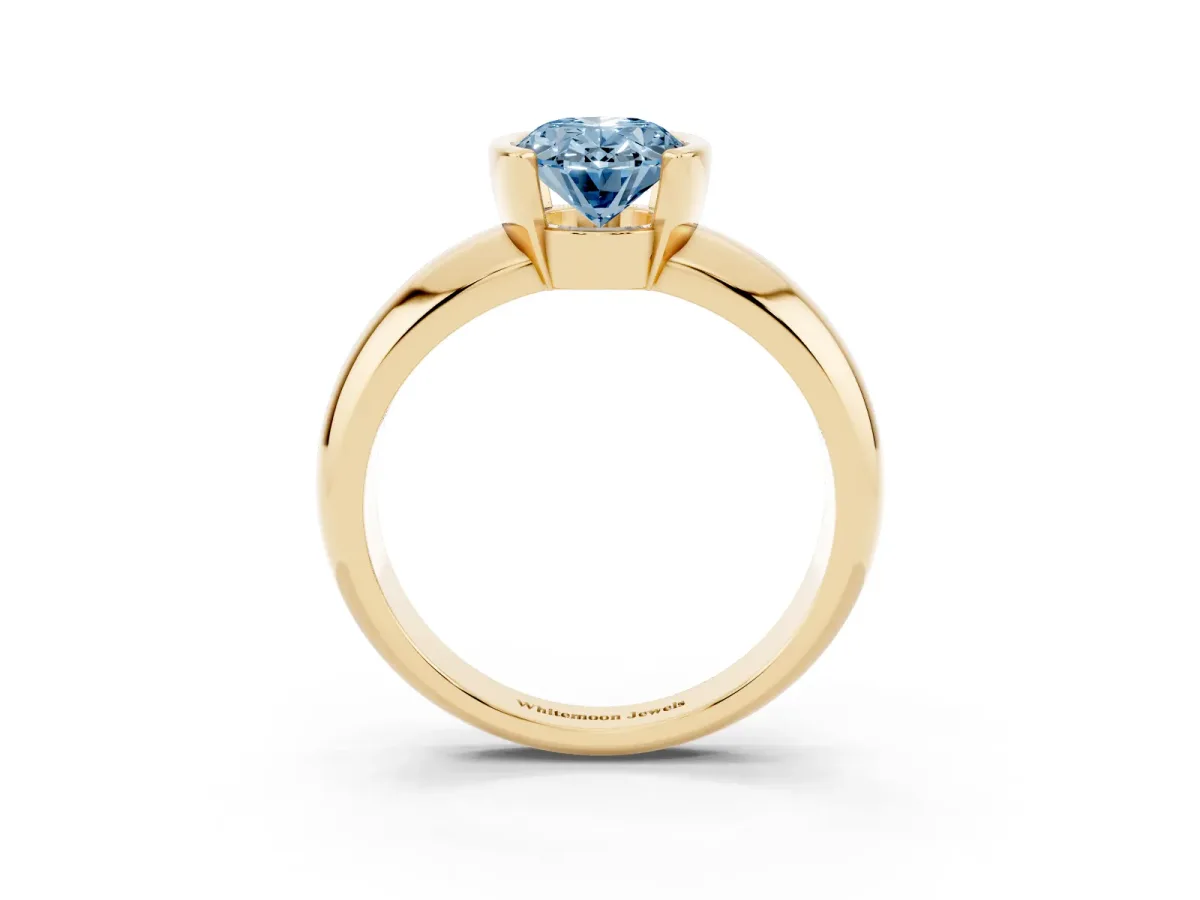 Fancy Blue Oval Cut Solitaire Tension Set Diamond Ring with Wide Band Yellow gold