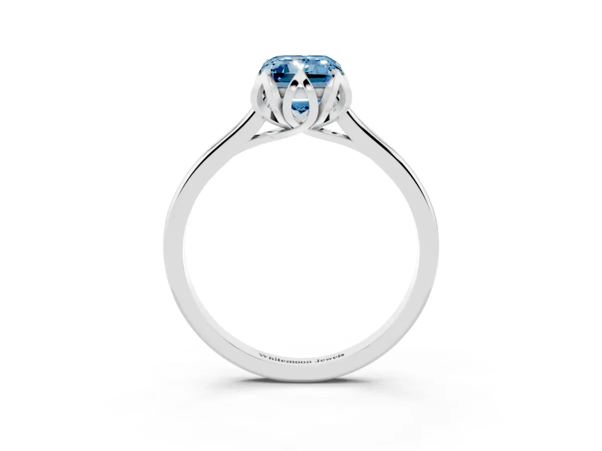 Fancy Blue Emerald Cut Diamond Solitaire Ring with Flower Prong Setting and Classic Band Silver