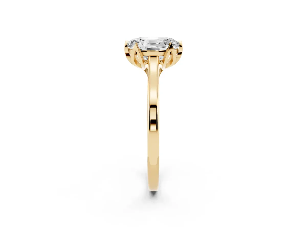 Oval Cut Diamond Solitaire Ring with Flower Prong Setting and Classic Band Yellow gold