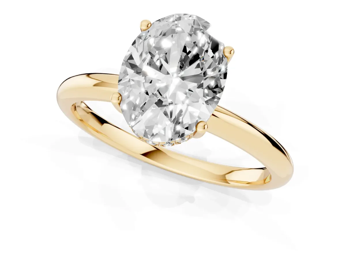 Oval Cut Cut Solitaire Engagement Ring with Four-Prong Setting and Classic Band Yellow gold