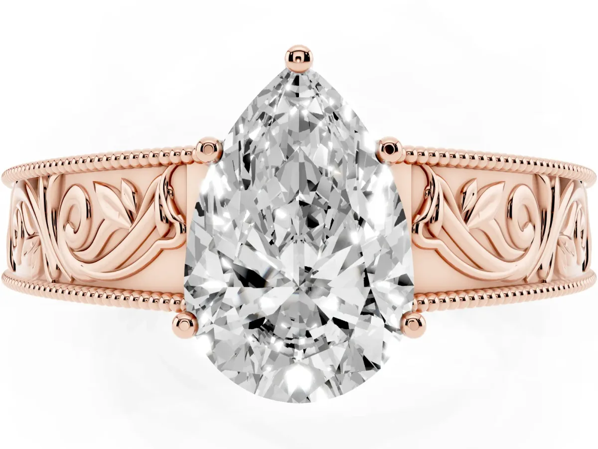 Pear Cut Diamond Solitaire Ring with Engraved Band and Four-Prong Setting Rose gold