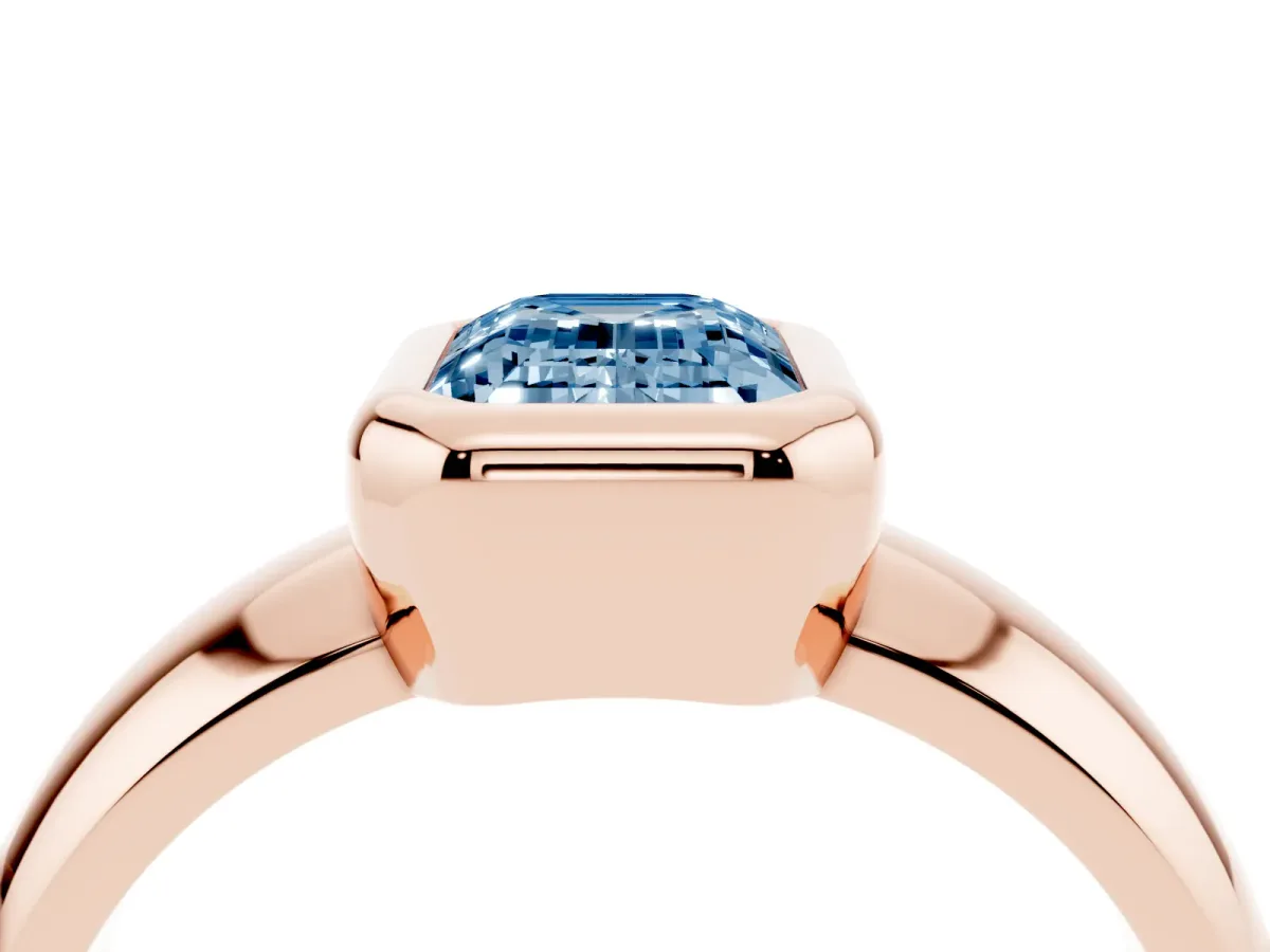 Fancy Blue Bezel Set Emerald Cut Solitaire Ring with Wide Band Rose gold