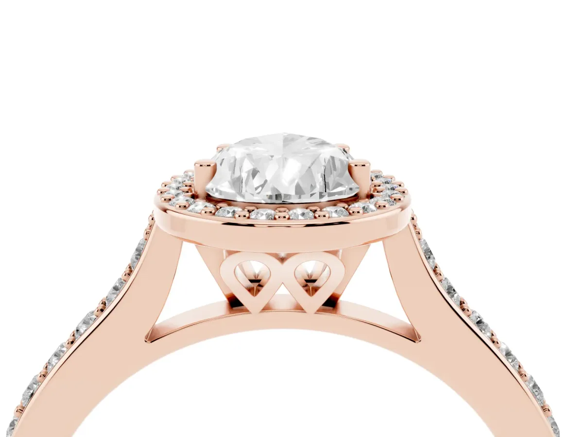 Pear Cut Diamond Halo Engagement Ring with Round Pavé Shoulders and Prong Setting Rose gold