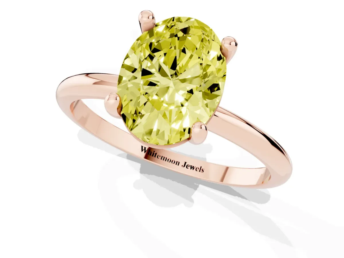 Fancy Yellow Oval Cut Solitaire Diamond Ring with 4-Prong Setting on a Classic Band Rose gold