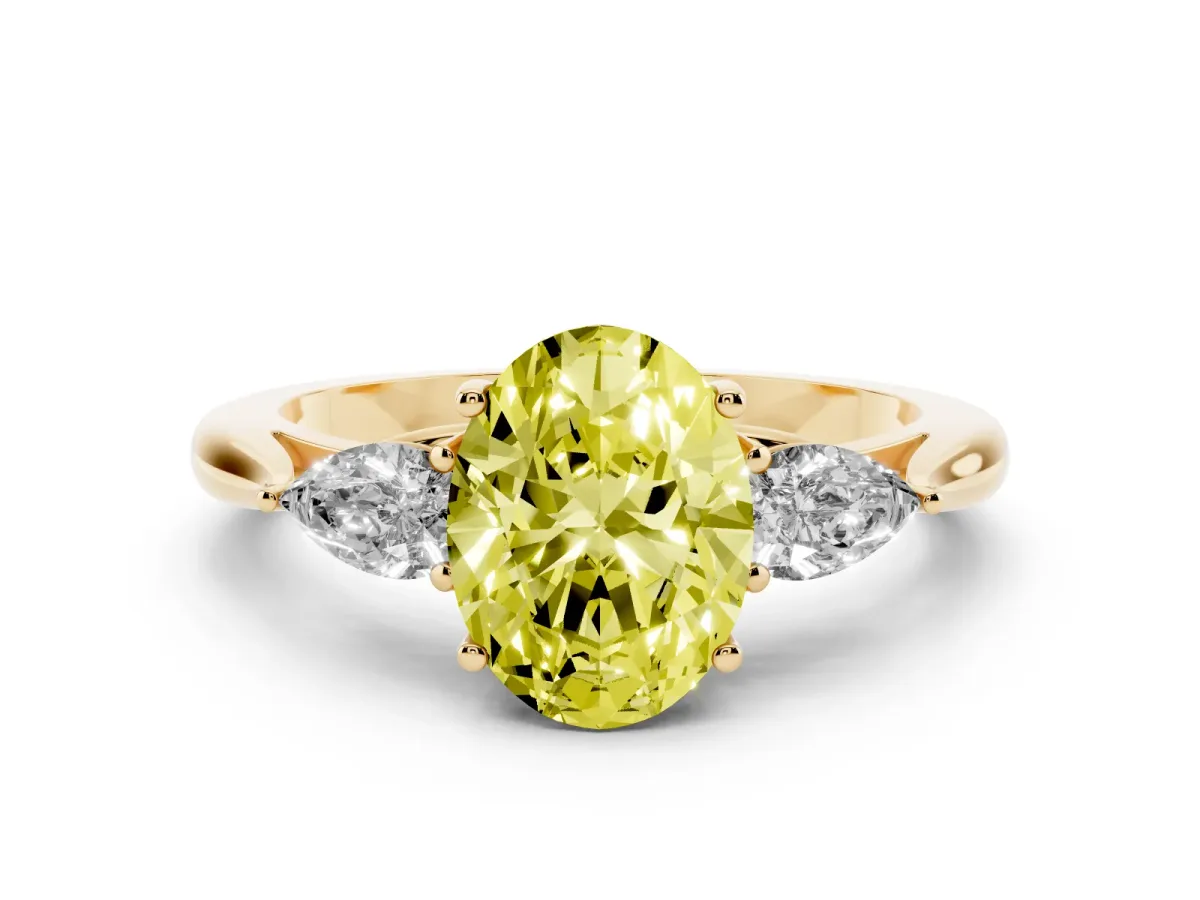Fancy Yellow Oval Cut Diamond Three-Stone Ring with Pear Side Stones and Prong Setting Yellow gold