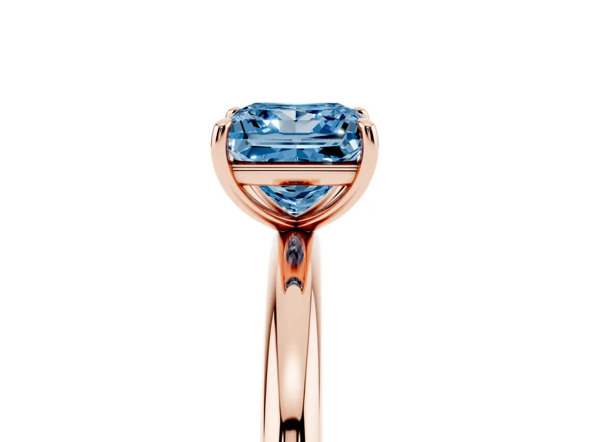 Fancy Blue Princess Cut Solitaire Diamond Ring with Four-Prong Setting on a Plain Band Rose gold