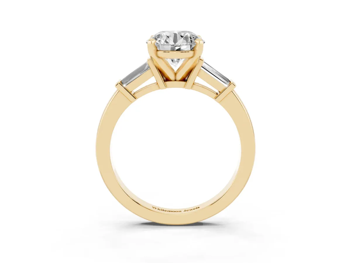 Round Cut Cut Diamond Solitaire Ring with Tapered Baguette Accents and Four-Prong Setting Yellow gold