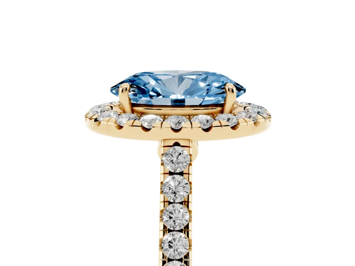 Fancy Blue Oval Cut Halo Pave Diamond Engagement Ring with Four-Prong Setting Yellow gold