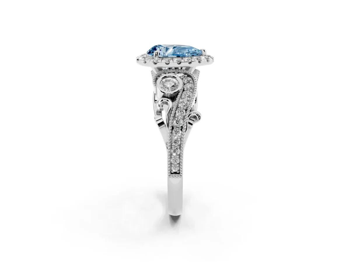 Fancy Blue Pear Cut Halo Diamond Ring with Milgrain and Bezel Accents on a Split Shank Band White gold