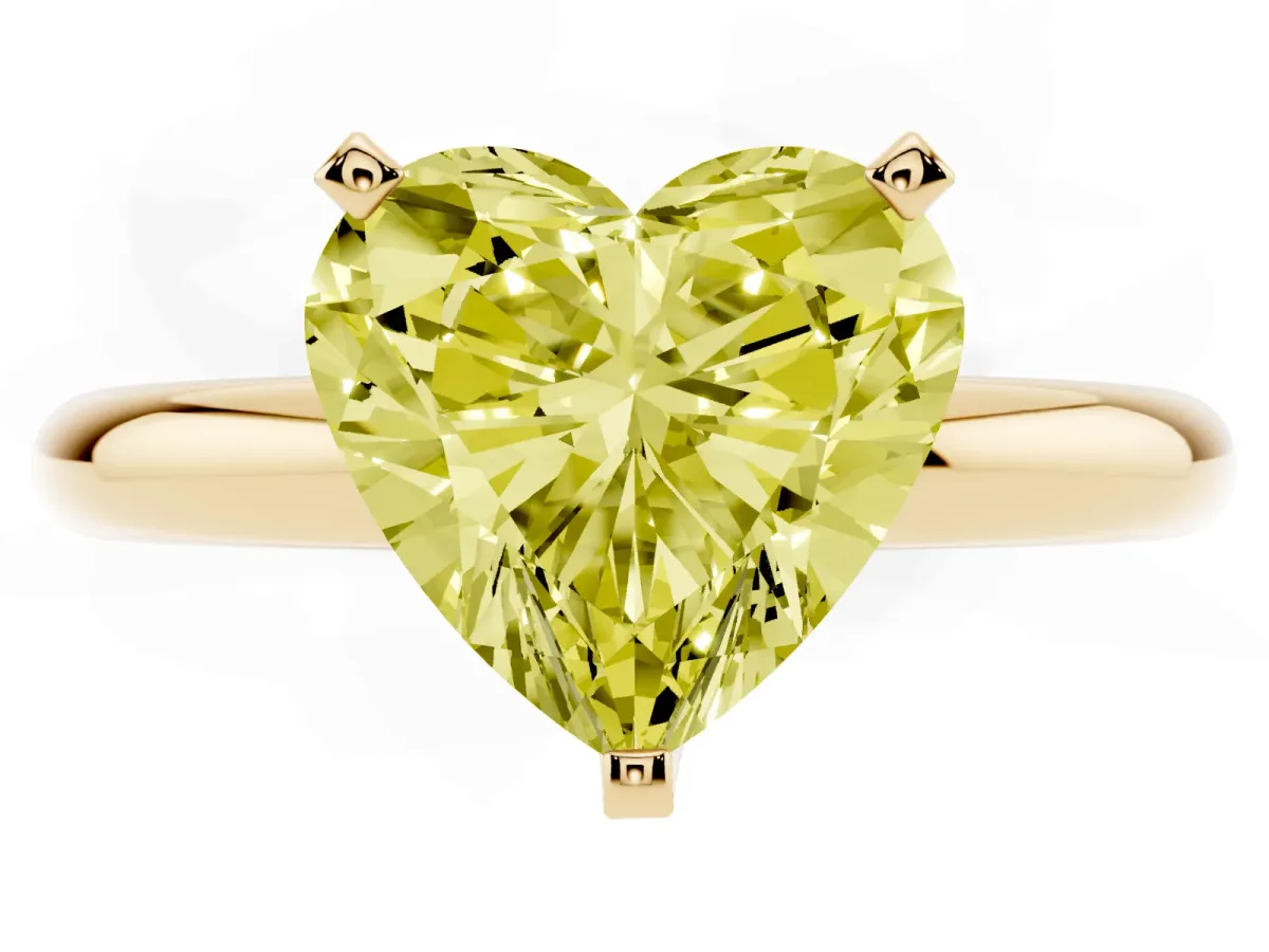 Fancy Yellow Heart Cut Diamond Solitaire Engagement Ring with Round Band and Four-Prong Setting Yellow gold