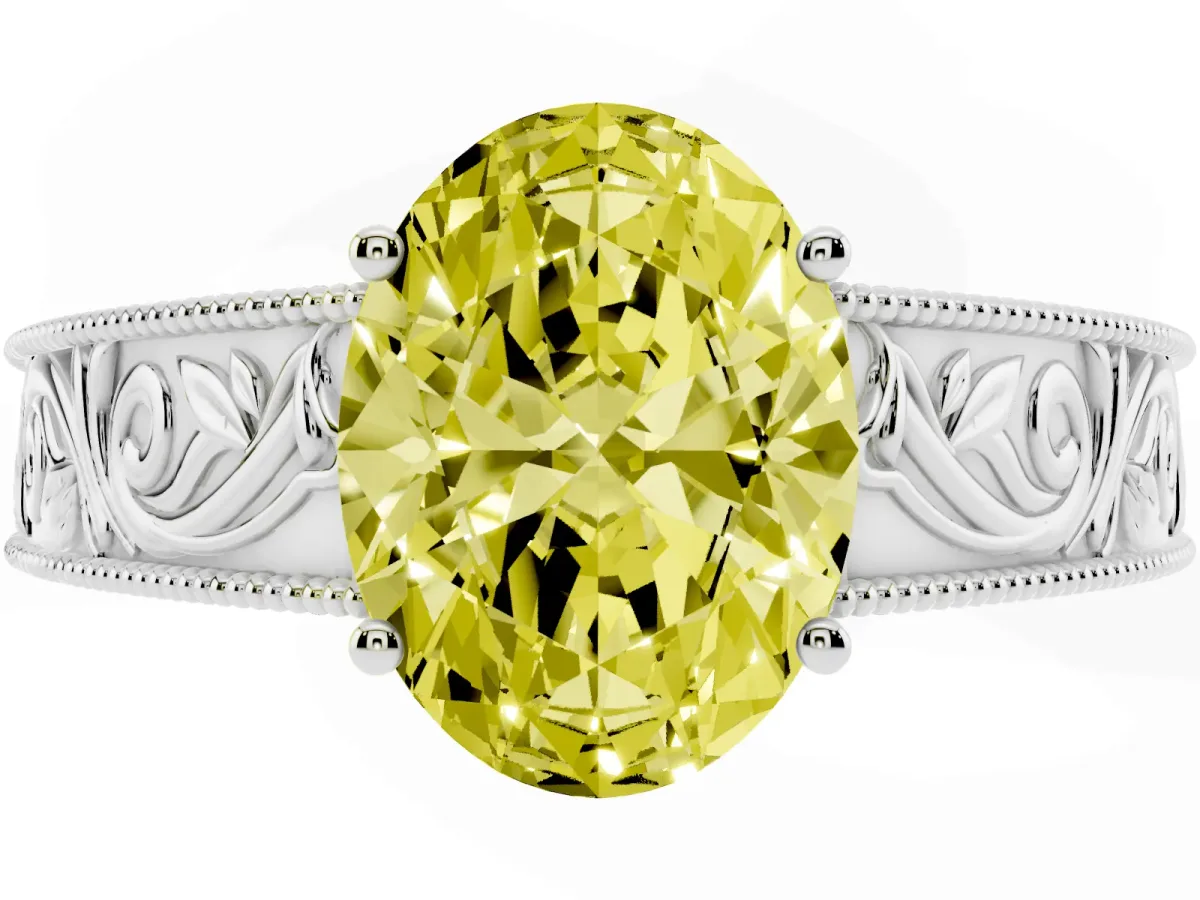 Fancy Yellow Oval Cut Diamond Solitaire Ring with Engraved Band and Four-Prong Setting Silver