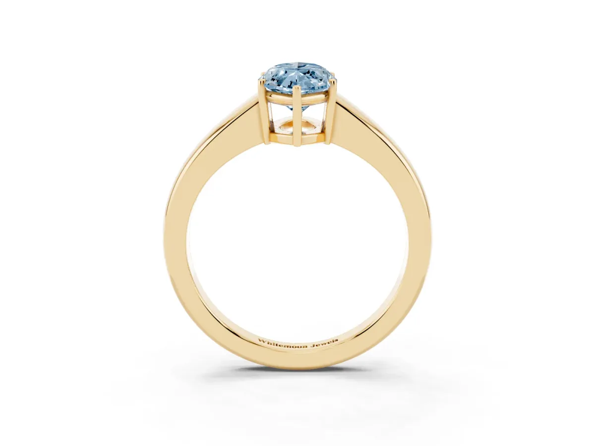 Fancy Blue Marquise Cut Solitaire Diamond Ring with Tapered Band and Four-Prong Setting Yellow gold