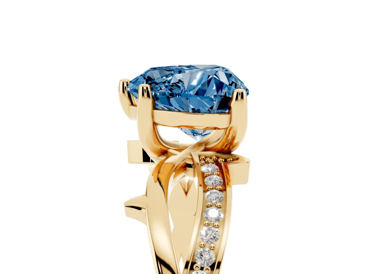 Fancy Blue Heart Cut Solitaire Twist Band with Pavé Accents and Four-Prong Setting Yellow gold