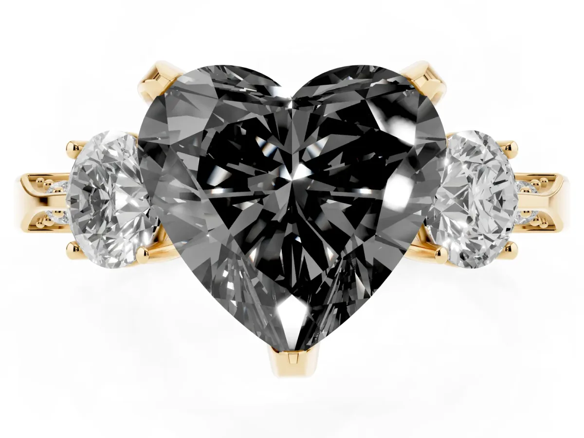 Fancy Black Heart Cut Brilliant Three-Stone Diamond Ring with Pavé Band and Four-Prong Setting Yellow gold