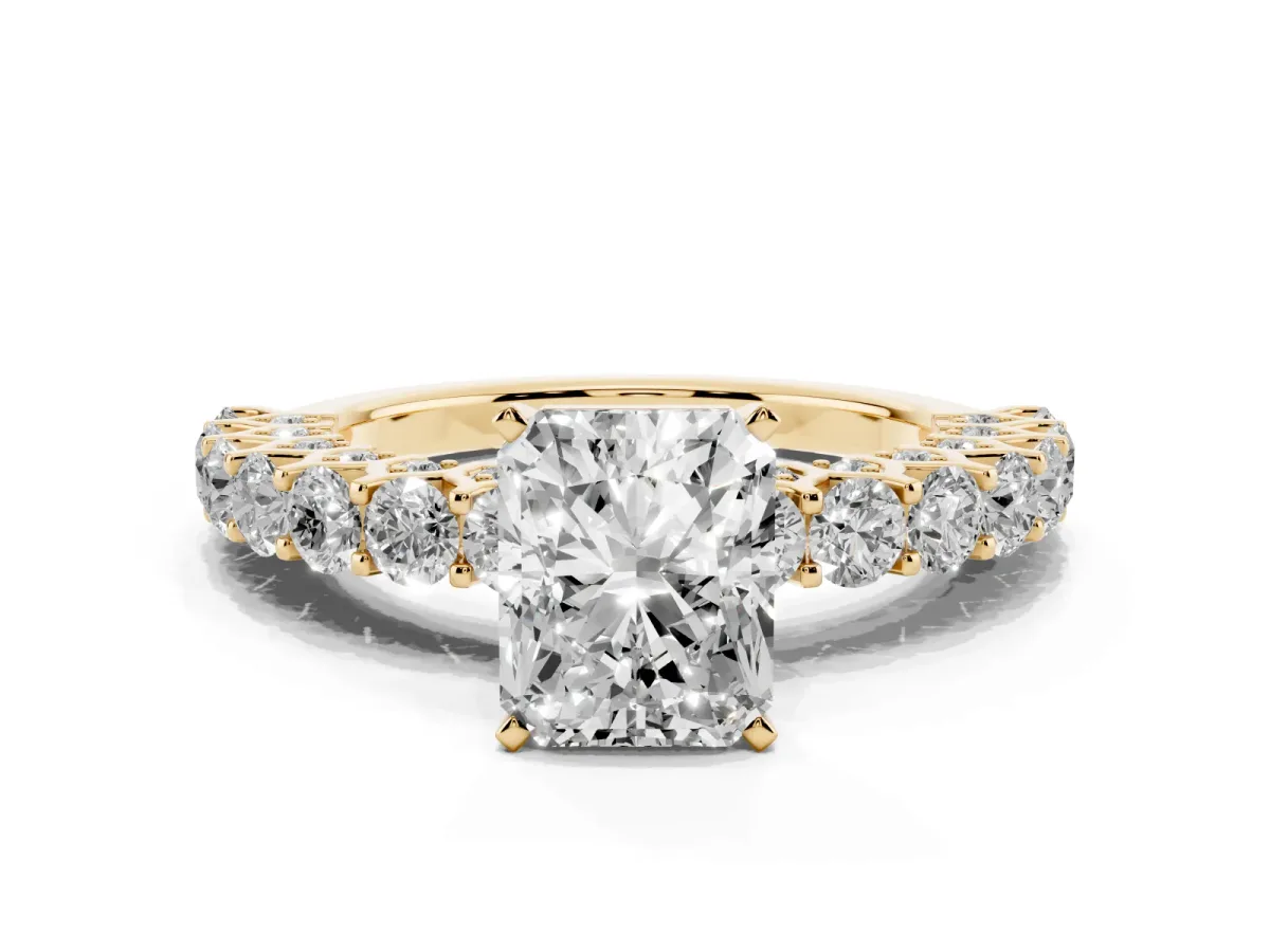 Radiant Cut Diamond Solitaire Ring with Shared Prong Pavé Band and Four-Prong Setting Yellow gold
