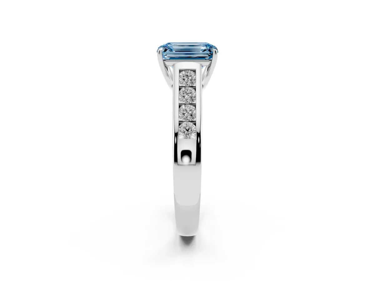 Fancy Blue Emerald Cut Brilliant Channel-Set Solitaire Ring with Four-Prong Setting Platinum