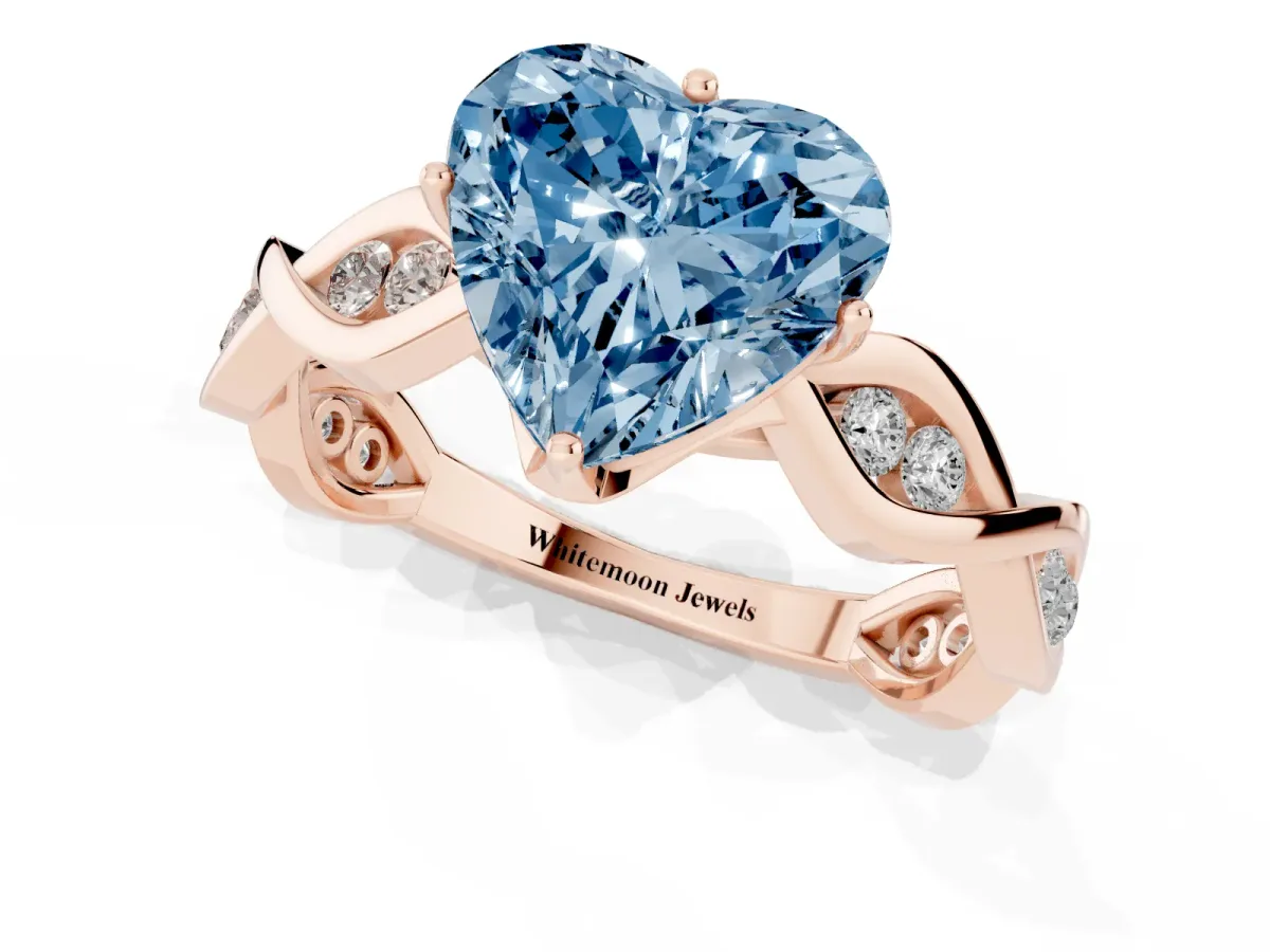 Fancy Blue Heart Cut Solitaire Twist Band with Leaf Prong Setting Rose gold