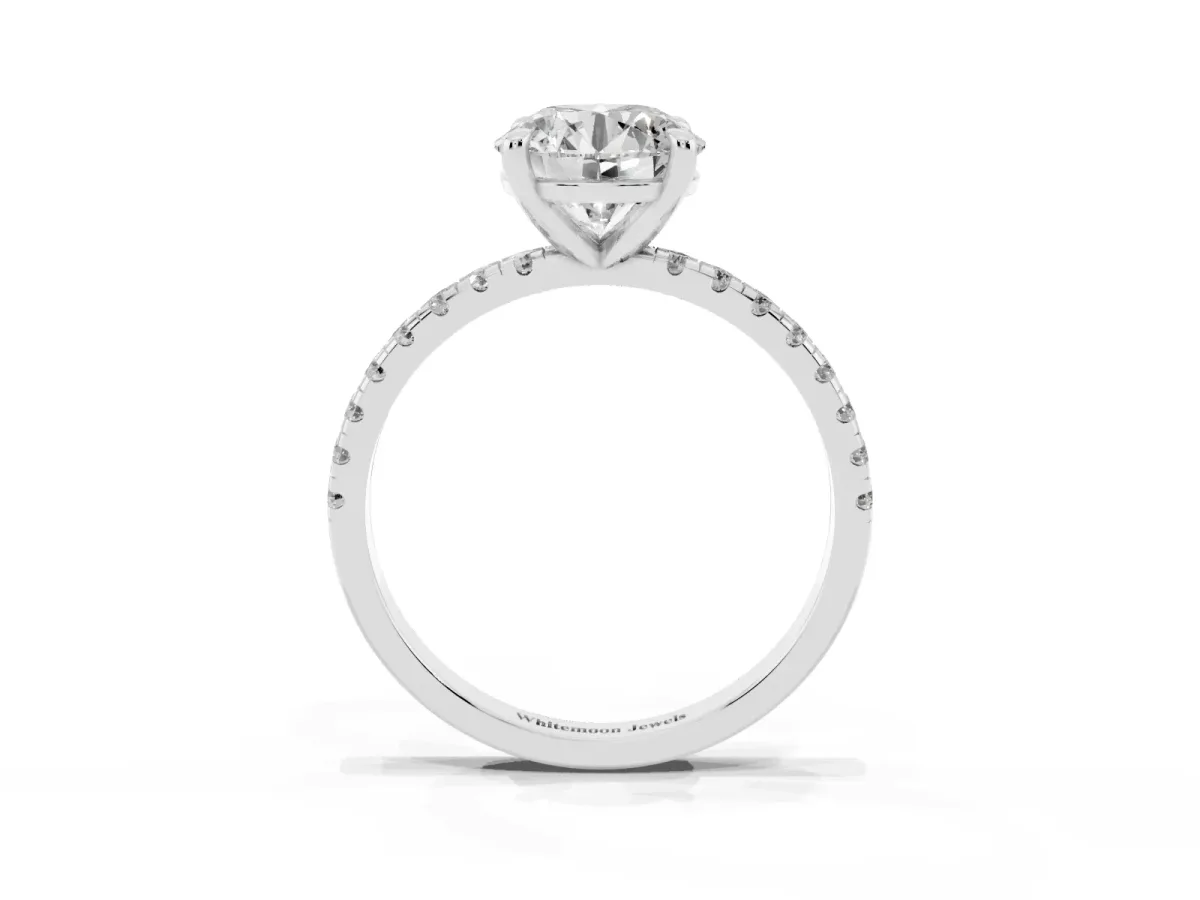 Round Cut Diamond Brilliant Solitaire Ring with Pavé Band and Four-Prong Setting Silver