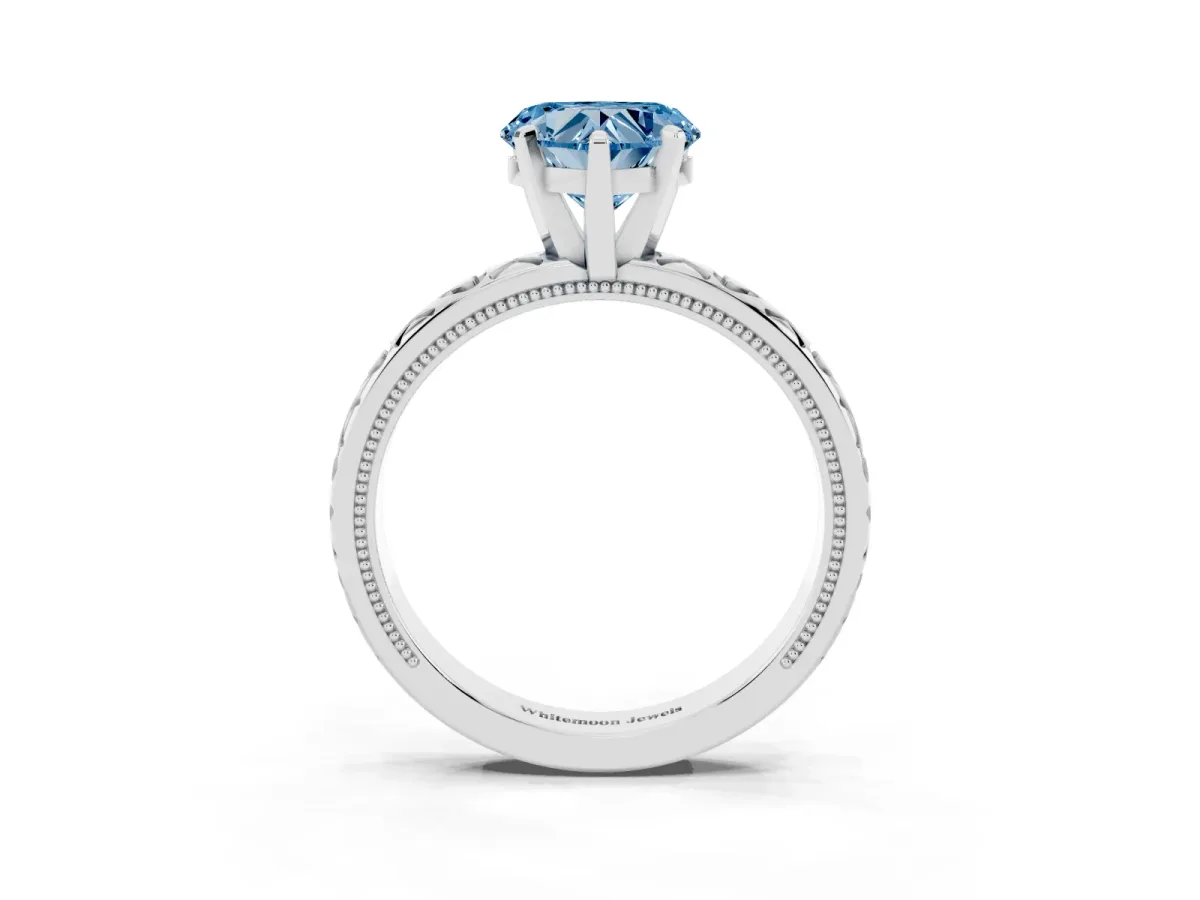 Fancy Blue Heart Cut Solitaire Diamond Engagement Ring with XO Engraved Band and Four-Prong Setting Silver