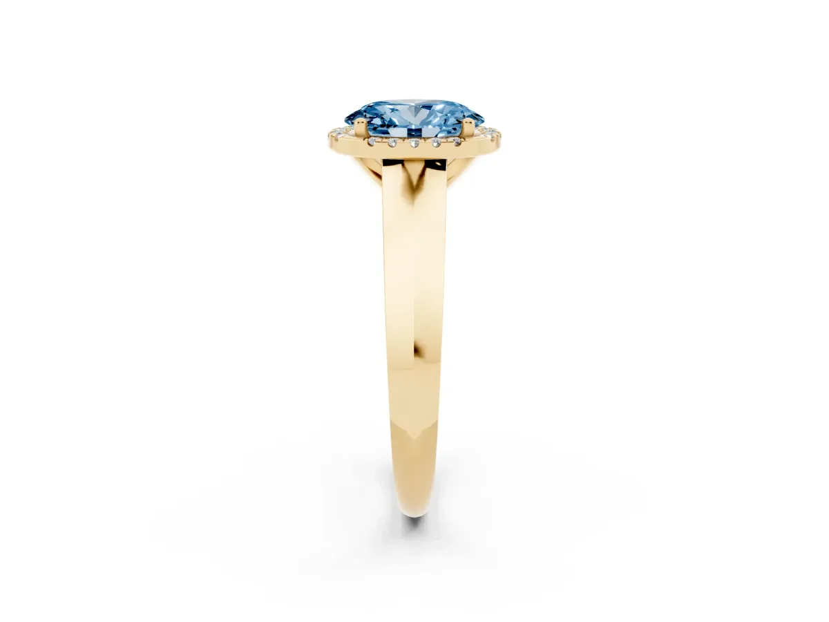 Fancy Blue Oval Cut Halo Diamond Ring with Cathedral Band and Four-Prong Setting Yellow gold