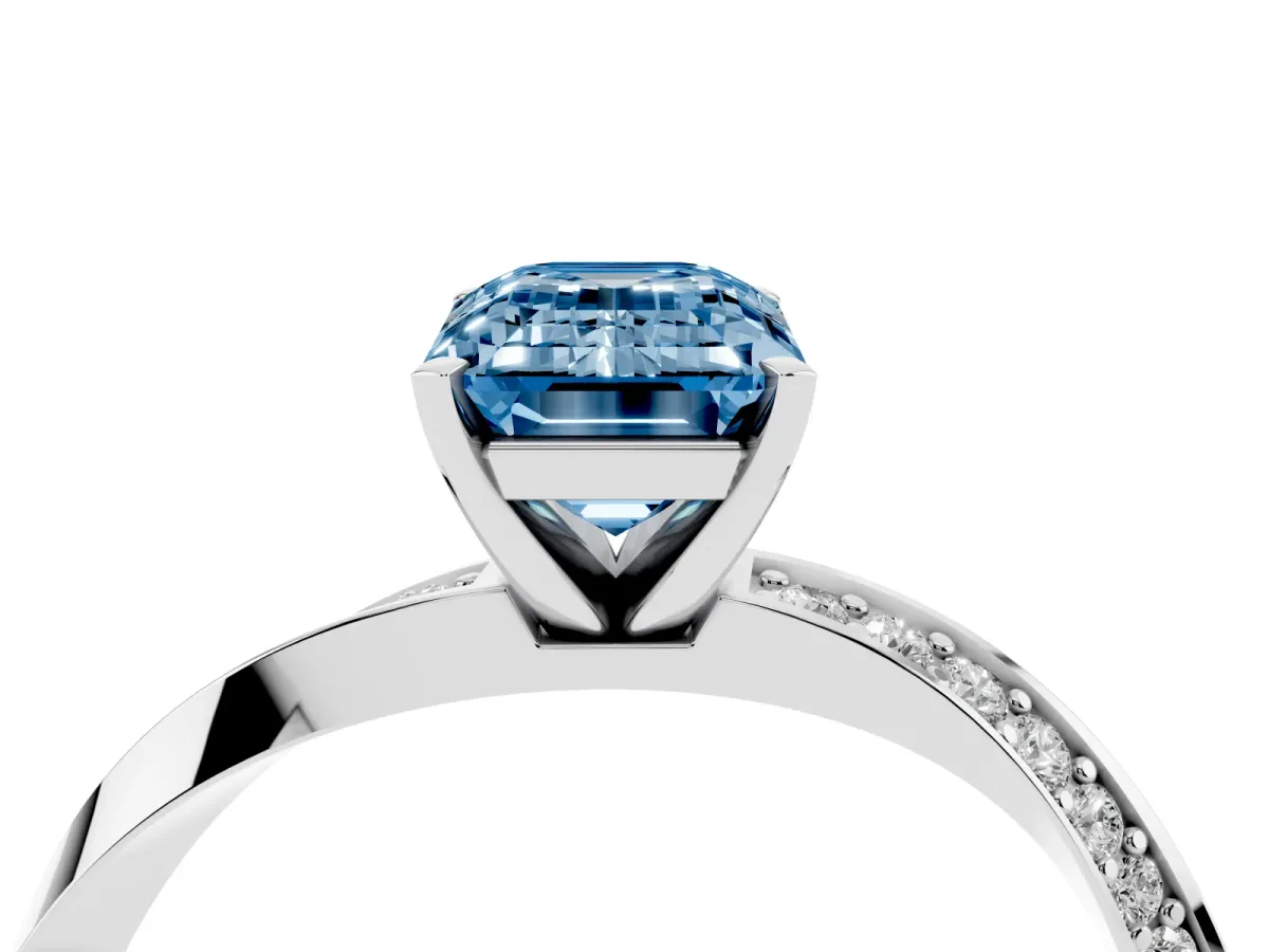 Fancy Blue Emerald Cut Diamond Engagement Ring with Side Stone Accents and Four-Prong Setting Silver