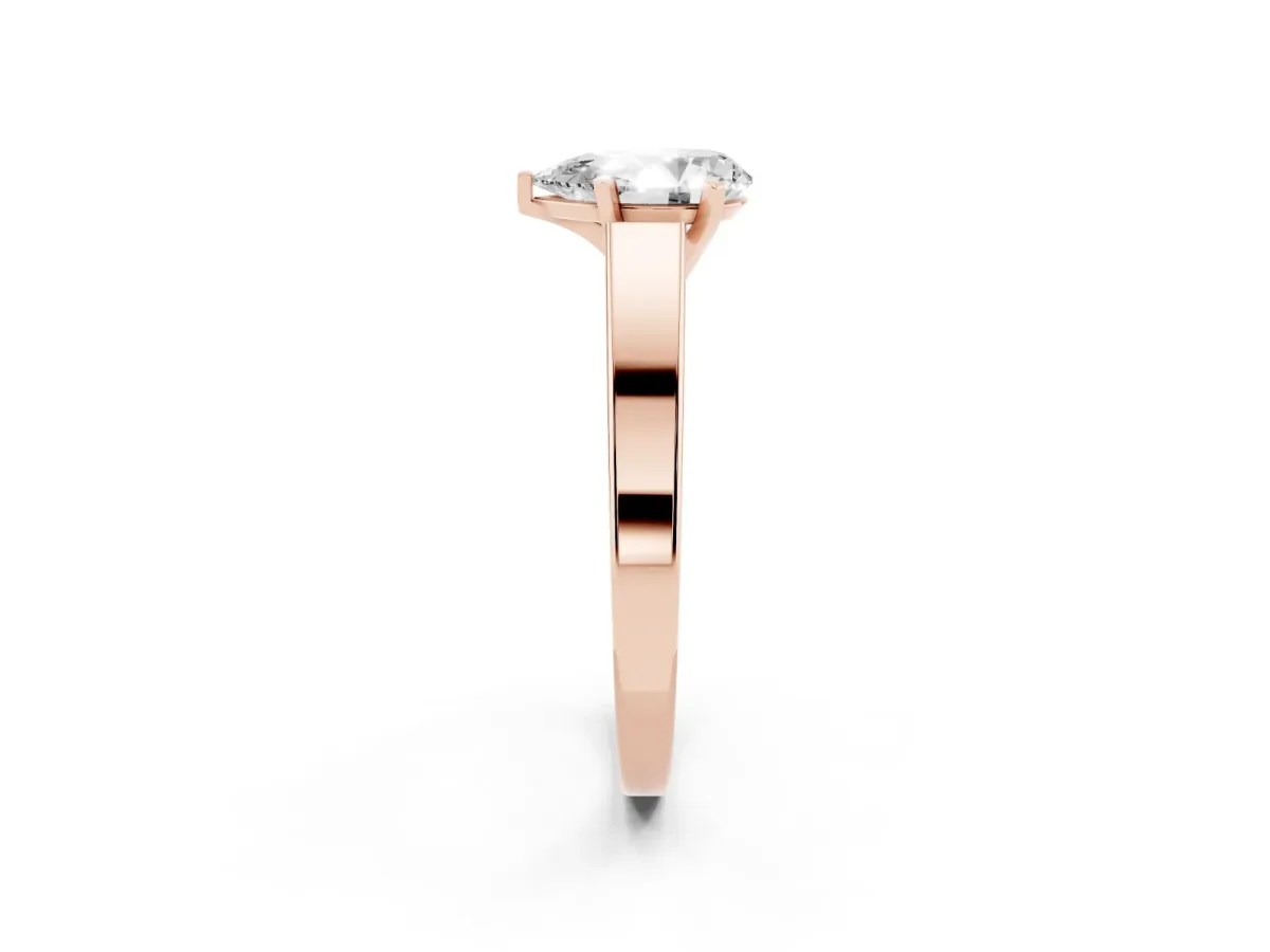 Pear Cut Solitaire Engagement Ring with Four-Prong Setting and Tapered Band Rose gold